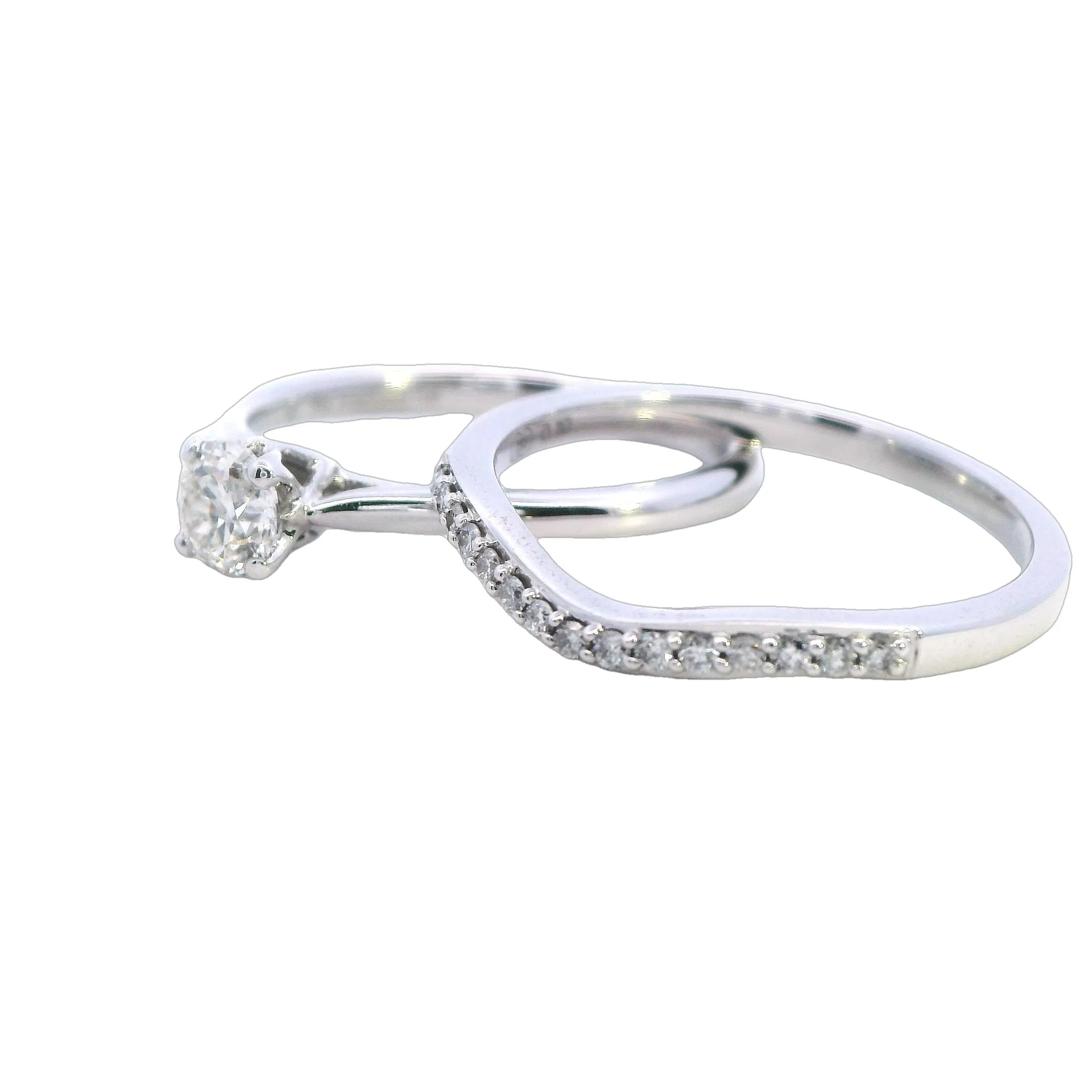 Enchanted Romance: Elegant White Gold Bridal Set with 0.50ct Diamond